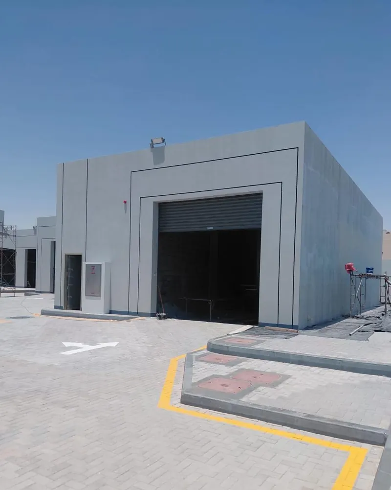 Completed station building with service bay
